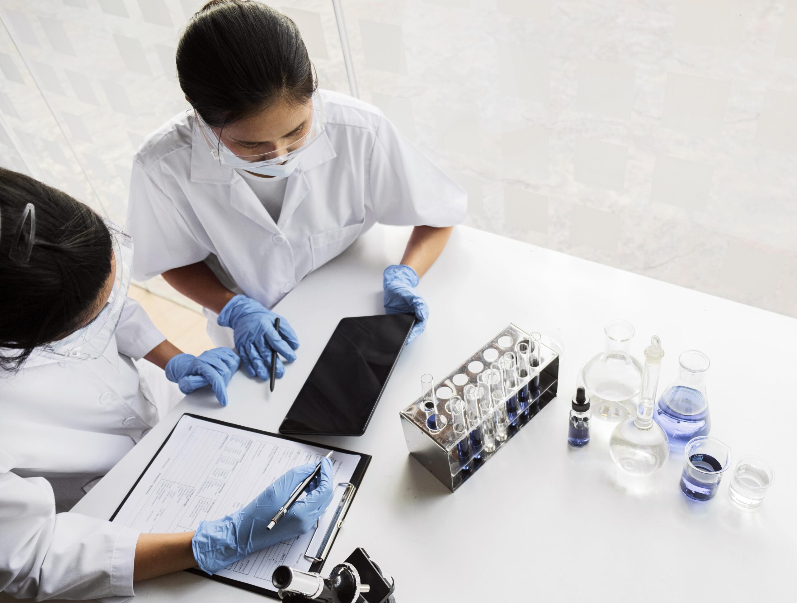 Medical Staff Reviewing Blood Test Results at Zamzam Family Clinic in Lawrenceville